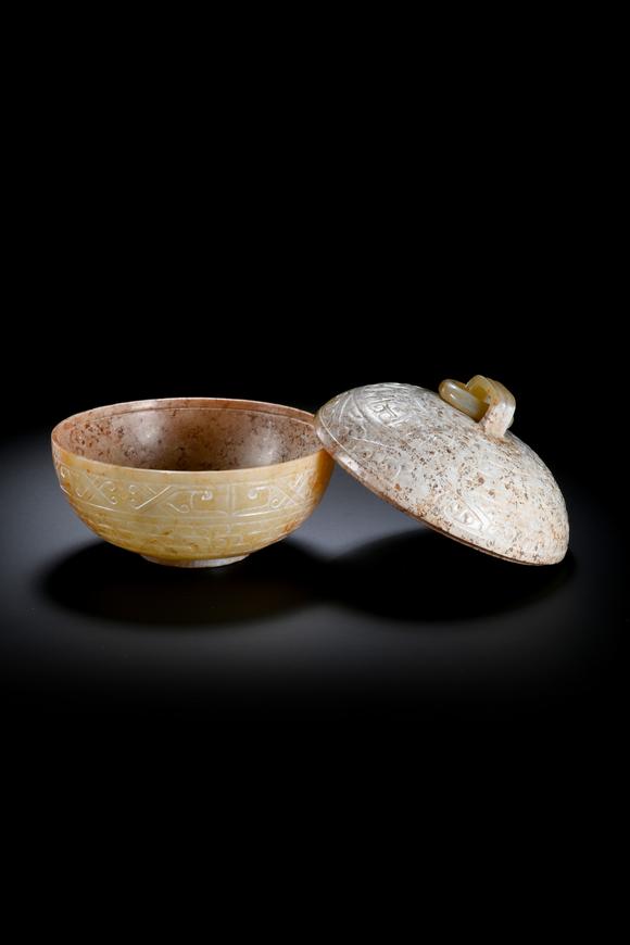 SEAVIEW AUCTIONS PTY LTDA Round White Jade Covered Box with Movable Ring Knob and Archaic Floral Scroll Carvings, 2nd BCE–3rd CE