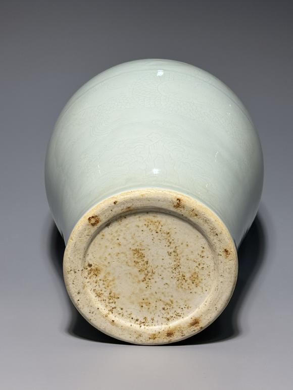 SEAVIEW AUCTIONS PTY LTDA White Porcelain Meiping Vase with Incised Dragon and Cloud Patterns, China, 18th century