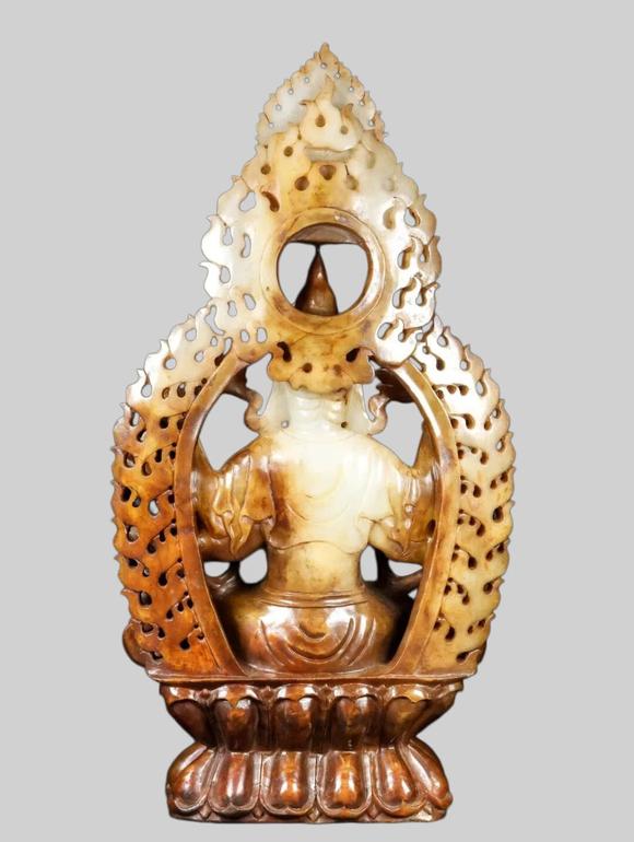 東京蕓術(shù)明 和田玉八臂鏤空佛像