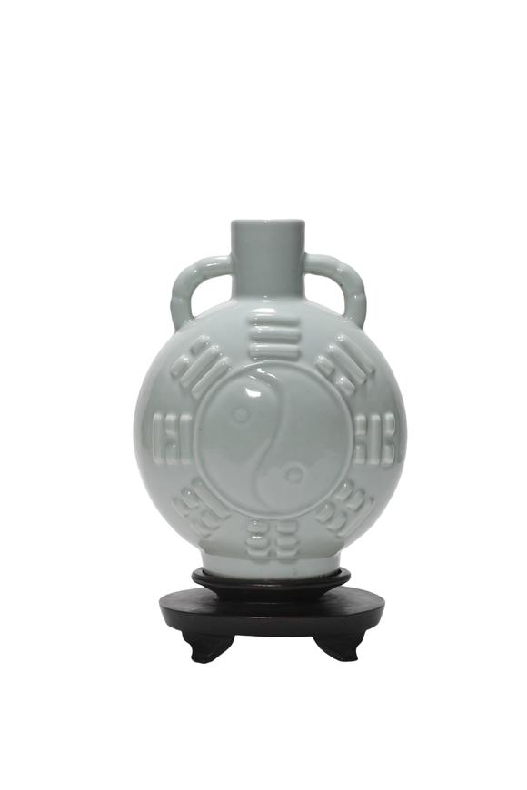 Castle AuctionA Light Celadon Bag Vase with Taiji Trigram Relief, 18th–19th C Pr.