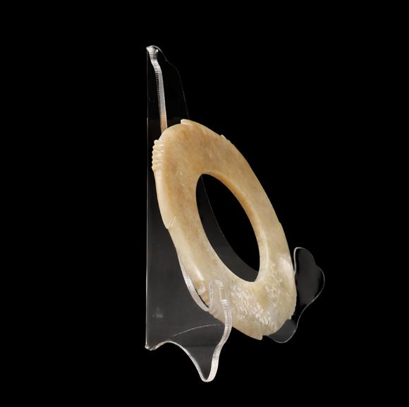 Castle AuctionA Calcified Pale Jade Notched Bi, Late Neolithic, Circa 3300–2300 C BC Pr.