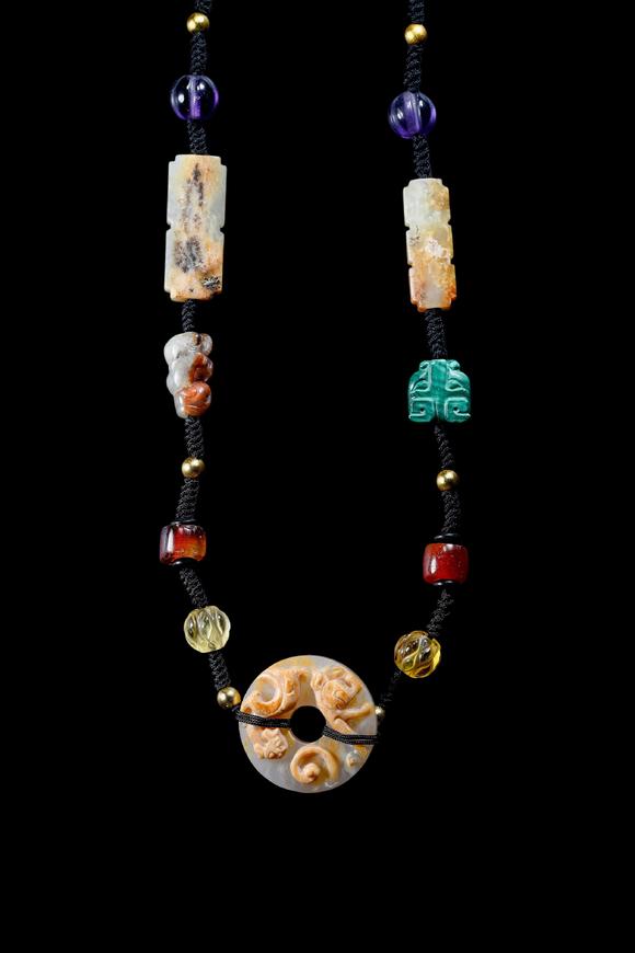 Castle AuctionA Multi-Coloured Hardstone Bead Necklace, Han, Circa 2nd C BC–2nd C AD Pr.