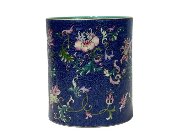 Castle AuctionBlue ground pastel with broken branch floral brush pot