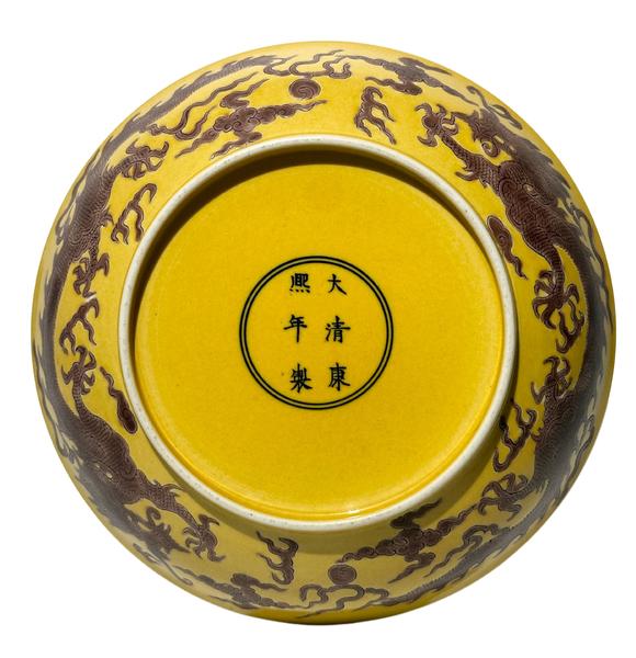 Castle AuctionYellow ground with purple dragon patterns dish, Kang Xi Pr. 