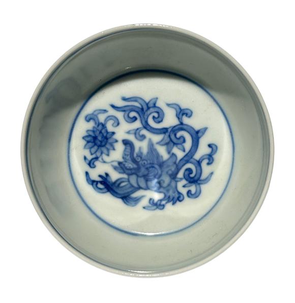Castle AuctionA Chinese blue-and-white round chi dragon patterned reclining foot cup, Ming Dynasty Pr. 