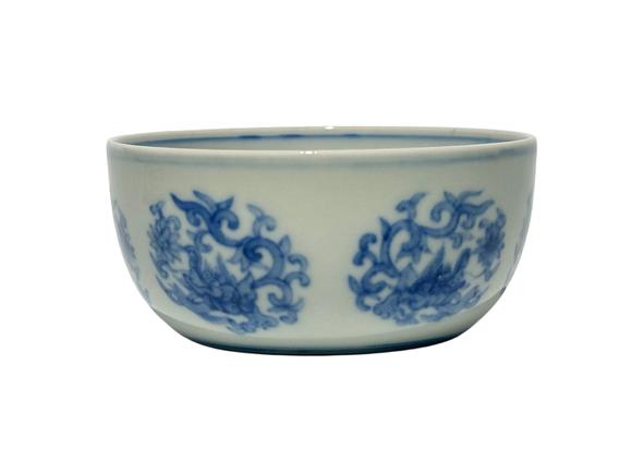 Castle AuctionA Chinese blue-and-white round chi dragon patterned reclining foot cup, Ming Dynasty Pr. 