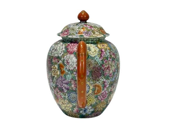 Castle AuctionThe famille rose and flowers décor teapot, Qian Long Pr. 