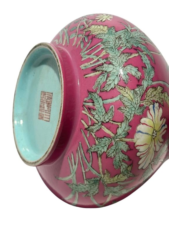 Castle AuctionA Chinese rouge-red ground famille rose vase, Qian Long Pr. 
