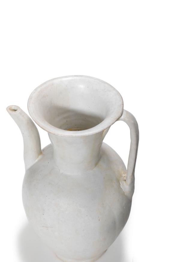 Castle AuctionA White Glaze Ewer and Two Black Glaze Tea Bowls with Metal Rims, 10th–13th C Pr.