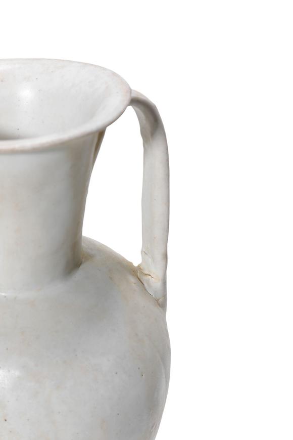 Castle AuctionA White Glaze Ewer and Two Black Glaze Tea Bowls with Metal Rims, 10th–13th C Pr.