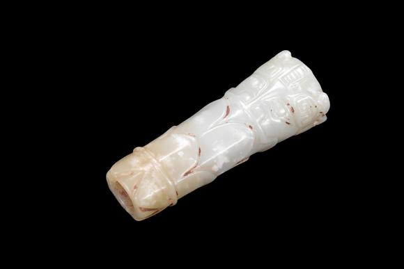 Castle AuctionA Pale Celadon Jade Taotie Tube Bead, Western Zhou, Circa 10th–9th C BC Pr.