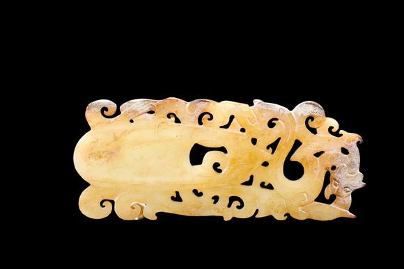 Castle AuctionA Pale Yellow Jade Openwork Dragon Phoenix Plaque, Han, Circa 2nd C BC–2nd C AD Pr.