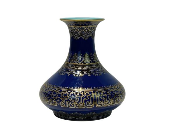Castle AuctionA Chinese blue ground vase with gilt dragon pattern, Qian Long Pr. 