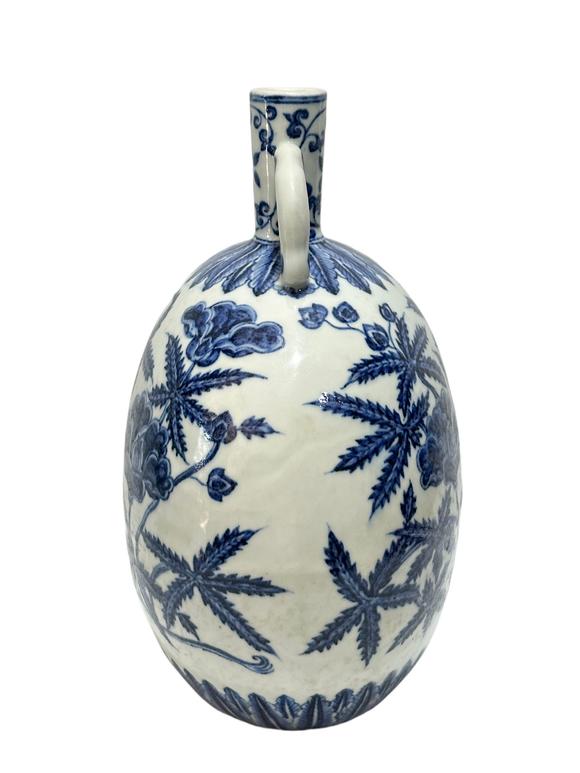 Castle AuctionA Chinese Blue and white okrA Chinese pattern moonflask vase, Ming Dynasty Pr. 