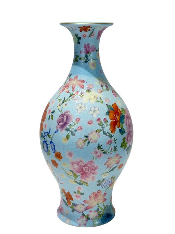 Castle AuctionA Chinese blue-ground Famille Rose vase, Qian Long Pr. 