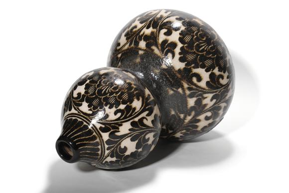 Castle AuctionA Cizhou Kiln Black Floral Double Gourd Vase, 12th–13th C Pr.