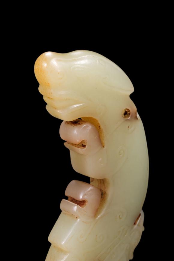 Castle AuctionA Pale Jade C-Shaped Dragon Pendant with Russet Veins, Late Shang, Circa 12th–11th C BC Pr.