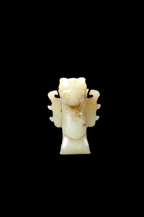 Castle AuctionA Pale Yellow Jade Human Mask Pendant, Shang, Circa 13th–11th C BC Pr.
