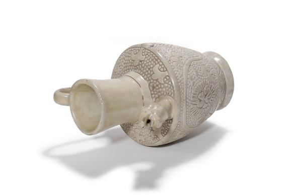 Castle AuctionA Cizhou Kiln Floral Carved Dragon Spout Ewer, 12th–13th C Pr.