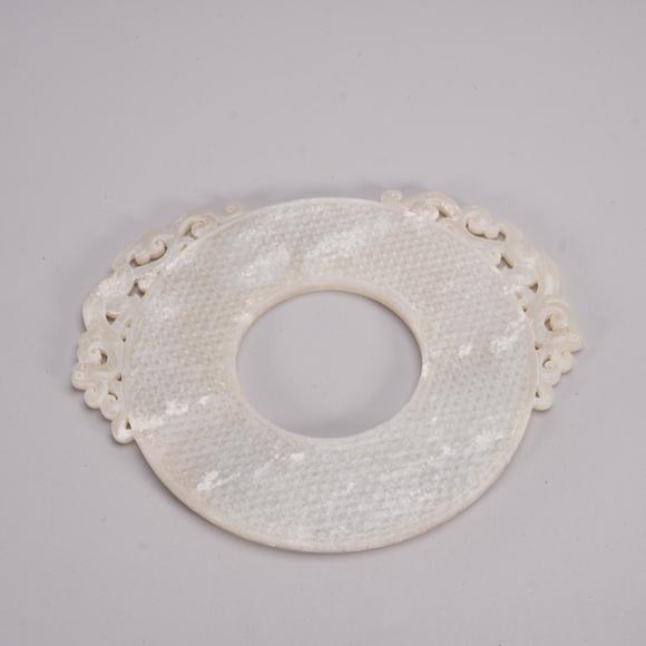 Eden Fine Antiques Galleries LLCA CHINESE WHITE JADE BI WITH DRAGON OPENWORK