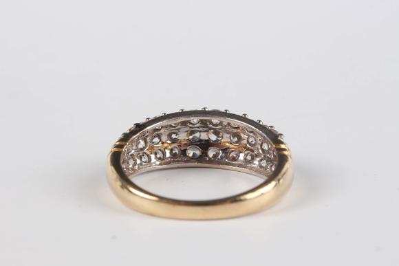 TooveysA 9ct gold ring, claw set with three oval cut green diopsides between baguette cut diamond set shoulders, ring size approx M, and a 9ct gold and colou