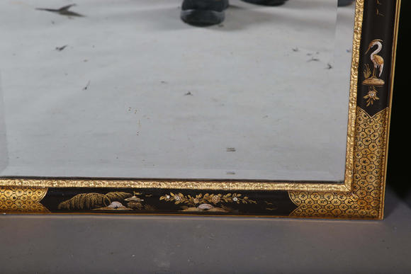 TooveysAn impressive pair of early 20th century Queen Anne style gilt and black japanned pier mirrors, each shaped crest with central shell and griffon heads
