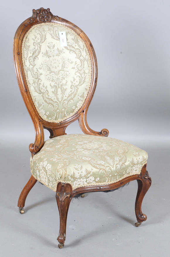 TooveysA mid-Victorian walnut showframe salon chair, height 97cm, width 51cm.