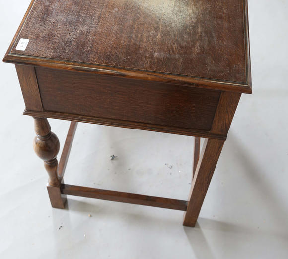 TooveysA George V oak two-drawer side table, height 77cm, width 71cm, depth 56cm.