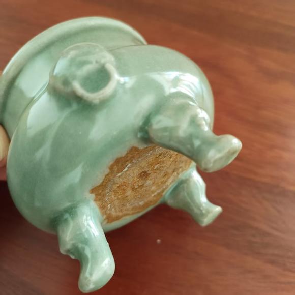 虎符拍賣青釉獸首三足爐
