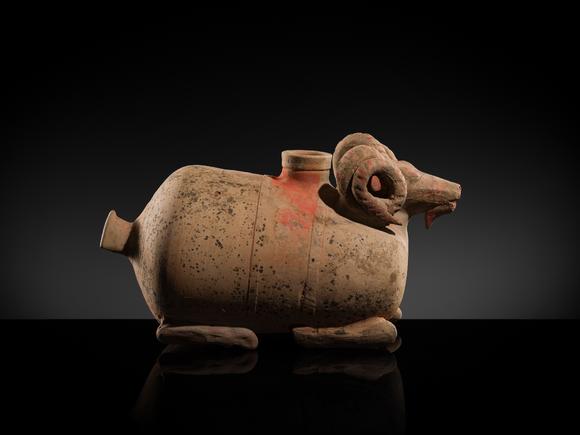 Galerie ZackeA LARGE PAINTED POTTERY ‘RAM’ VESSEL, ZUN, HAN DYNASTY