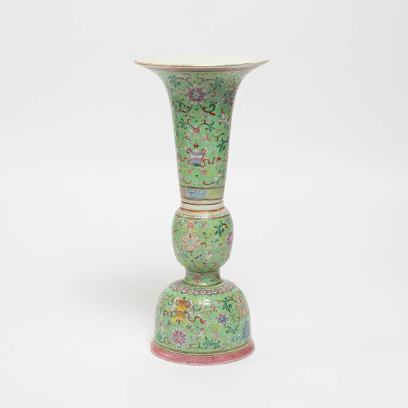 Waddington'sA Lime-Green Ground Famille Rose Gu-Form Vase, Daoguang Period (1821-1850), 清 道光 綠地粉彩八吉祥番蓮紋花觚