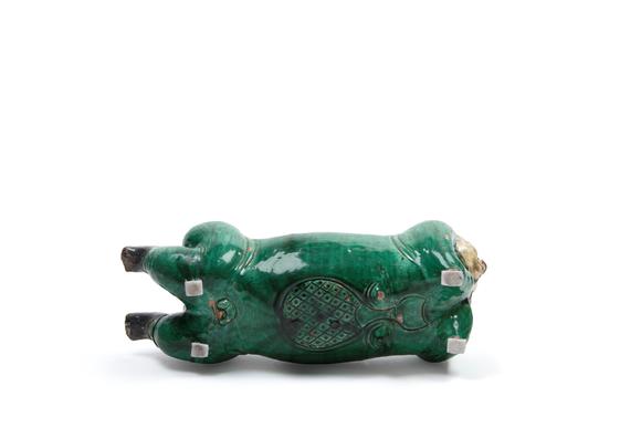 Marcopolo AuctionsPOLYCHROME SANCAI CERAMIC SCULPTURE DEPICTING A RECLINING CHILD, China, late 19th / early 20th century