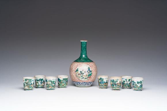 Coronari Auctions BVA Japanese Kutani 'tokuri' or sake bottle and eight cups with landscape design, Meiji, 19th C.