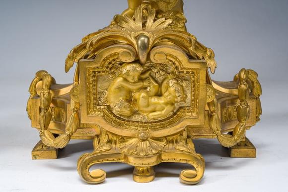 Coronari Auctions BVA fine and exceptional French Napoleon III gilt bronze three-piece clock garniture with putti and floral design, 19th C.