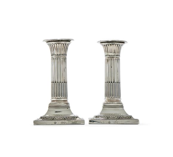 DreweattsA PAIR OF VICTORIAN SILVER CANDLESTICKS, WILLIAM HUTTON & SONS LTD., LONDON 1895