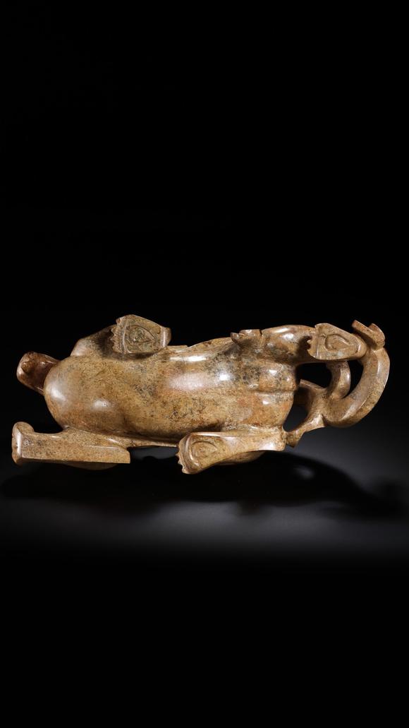 JUBAO HALL AUCTION HOUSE INCPre-Ming Dynasty Feathered Man Taming a Beast