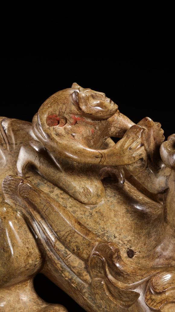 JUBAO HALL AUCTION HOUSE INCPre-Ming Dynasty Feathered Man Taming a Beast