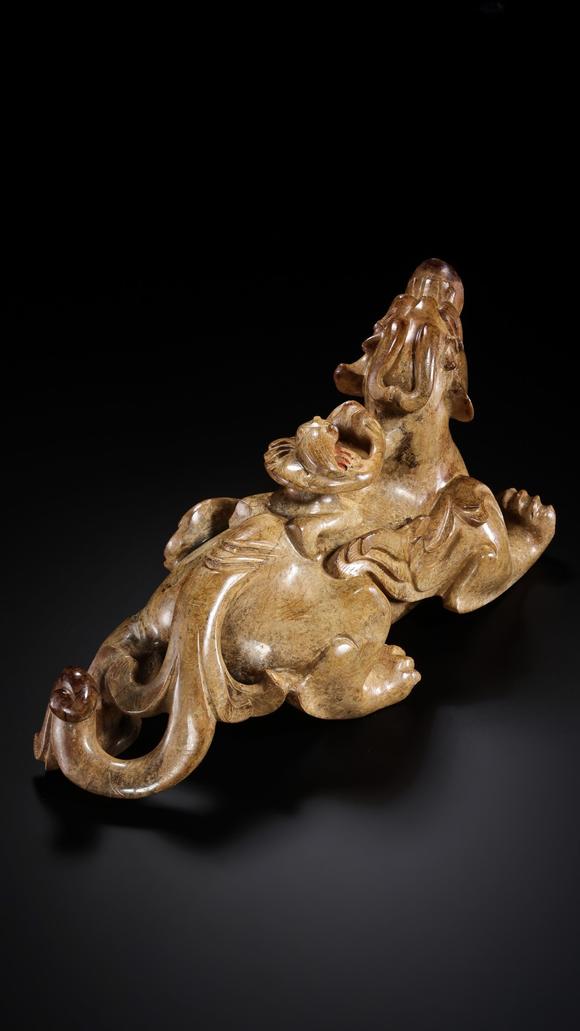 JUBAO HALL AUCTION HOUSE INCPre-Ming Dynasty Feathered Man Taming a Beast