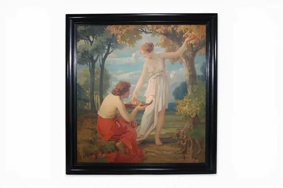 Goldfield Auction sarlsémile BERCHMANS (1867-1947), Young women with a fruit basket. 
Oil on canvas depicting two young women in a bucolic landscape. One, standing under a tree, holds out a piece of fruit, while the other, kneeling, presents a filled basket. The scene unfolds against a luminous backdrop of hills and trees with golden foliage, evoking a timeless, pastoral atmosphere. The figures, treated with softness and elegance, recall the symbolist and decorative aesthetic characteristic of émile Berchmans' work, 