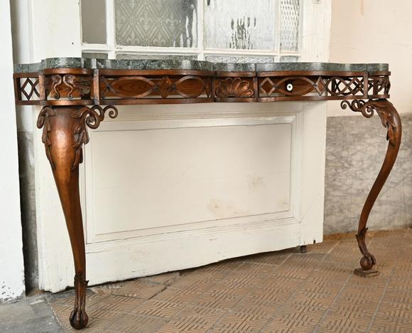 Loeckx AuctioneersWrought iron console with marble top, 1950s…