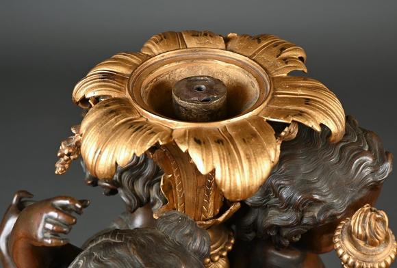 Loeckx AuctioneersA large and fine ornament in bronze \'three putti\',…