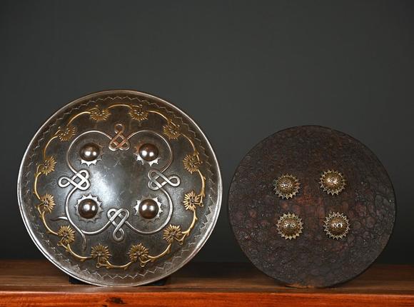 Loeckx AuctioneersCollection: an Indian metal shield and a leather s…