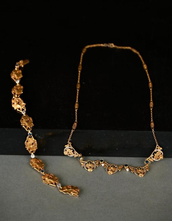 Loeckx AuctioneersA gold necklace and a bracelet, Art Nouveau…
