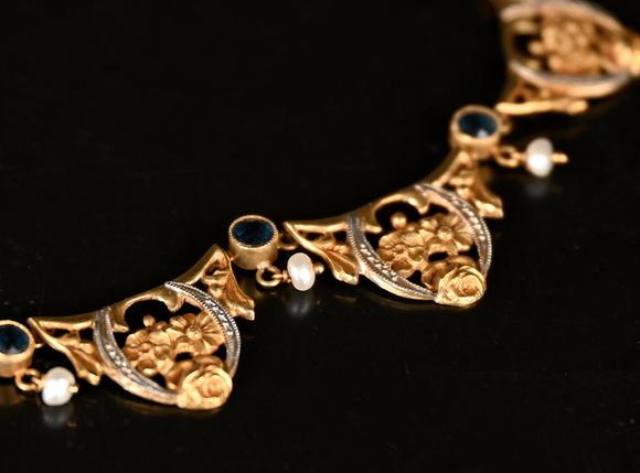 Loeckx AuctioneersA gold necklace and a bracelet, Art Nouveau…
