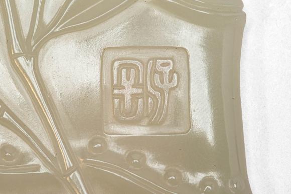 Apollo Art AuctionsQing Dynasty, Ca. AD 1644 - 1912. >
A carved celadon jade brush rest in the form of a naturalisti