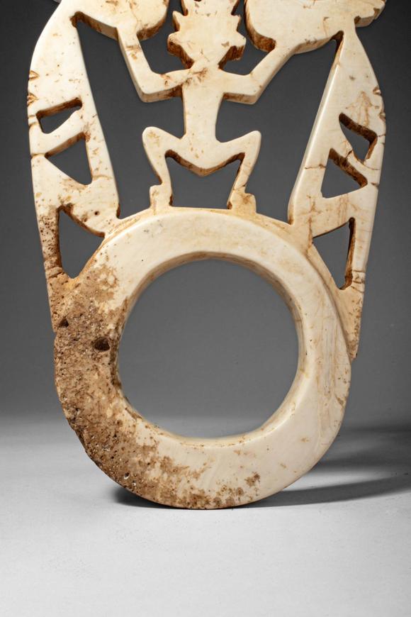 Apollo Art AuctionsCa. early 20th century AD. >
A pale stone openwork barava pendant features a complex figural comp