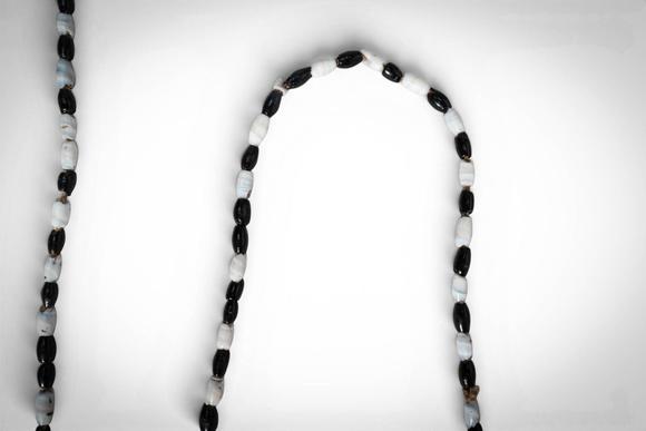 Apollo Art AuctionsCa. late 19th - early 20th century AD. >
A group comprising four necklaces of varying lengths, st