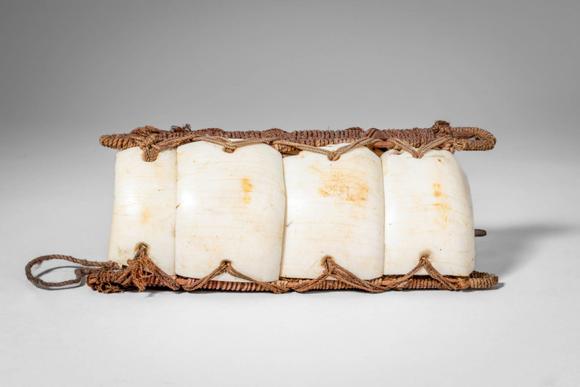 Apollo Art AuctionsCa. early 20th century AD. >
An armband composed of a Conus shell, of the type traditionally worn