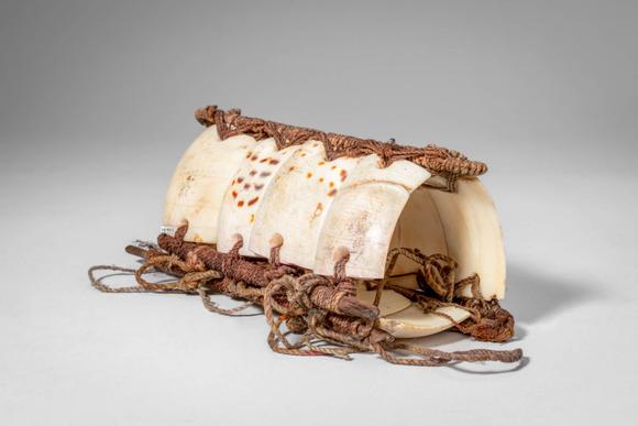 Apollo Art AuctionsCa. early 20th century AD. >
An armband composed of a Conus shell, of the type traditionally worn