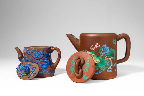 Apollo Art AuctionsQing Dynasty, Ca. AD 1644 - 1912. >A charming pair of Yixing stoneware teapots, each decorated wi